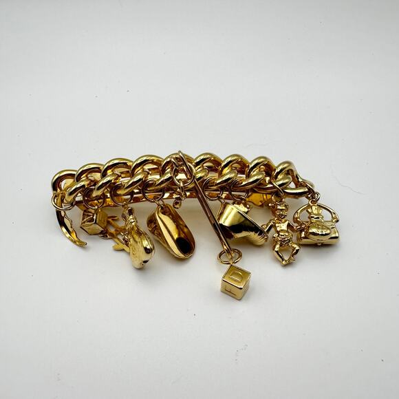 Kirks Folly Accessories - Kirks Folly France USA Gold Tone Fully Loaded Charm Barrette Million Dollar Baby